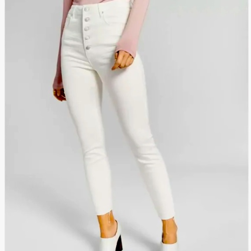 Scissor hem button fly skinny jeans
